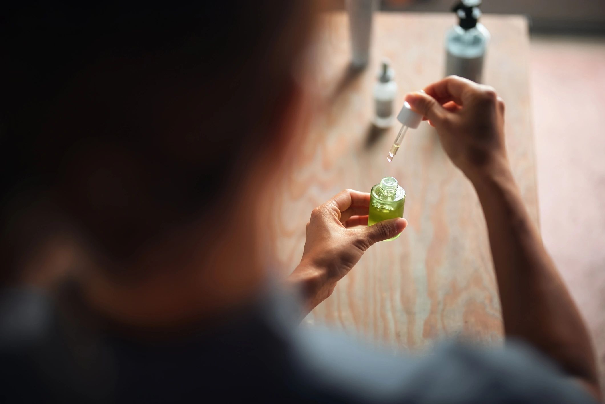 CBD oil bottles and hemp leaves wellness